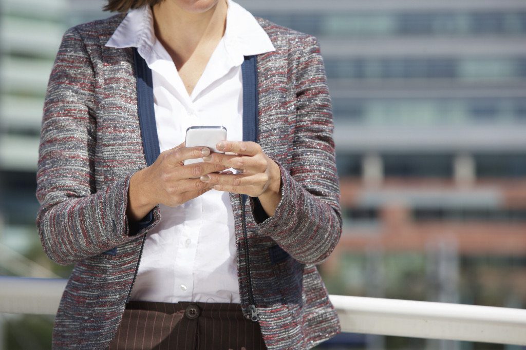 office woman with phone